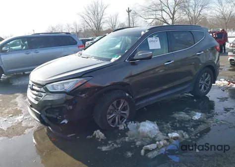 2014 Hyundai Santa Fe Sport 2.4L z USA, uszkodzony, nr VIN 5XYZUDLB5EG136383